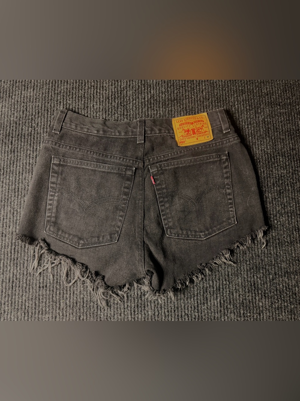 Levi’s 550 Black Relaxed Fit Distressed Cutoff Denim Shorts